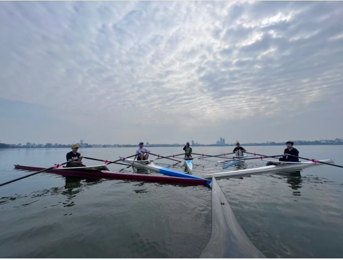 Single sculls on West Lake, Hanoi