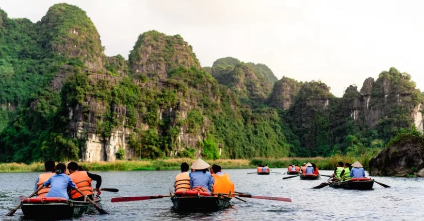 Boat ride through Tam Coc, Ninh Binh